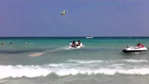 Saturn SD470 on Miami South Beach taking every day beating by surf.
